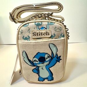 NWT. Disney’s Lilo and Stitch Canvas Primark Crossbody phone bag.